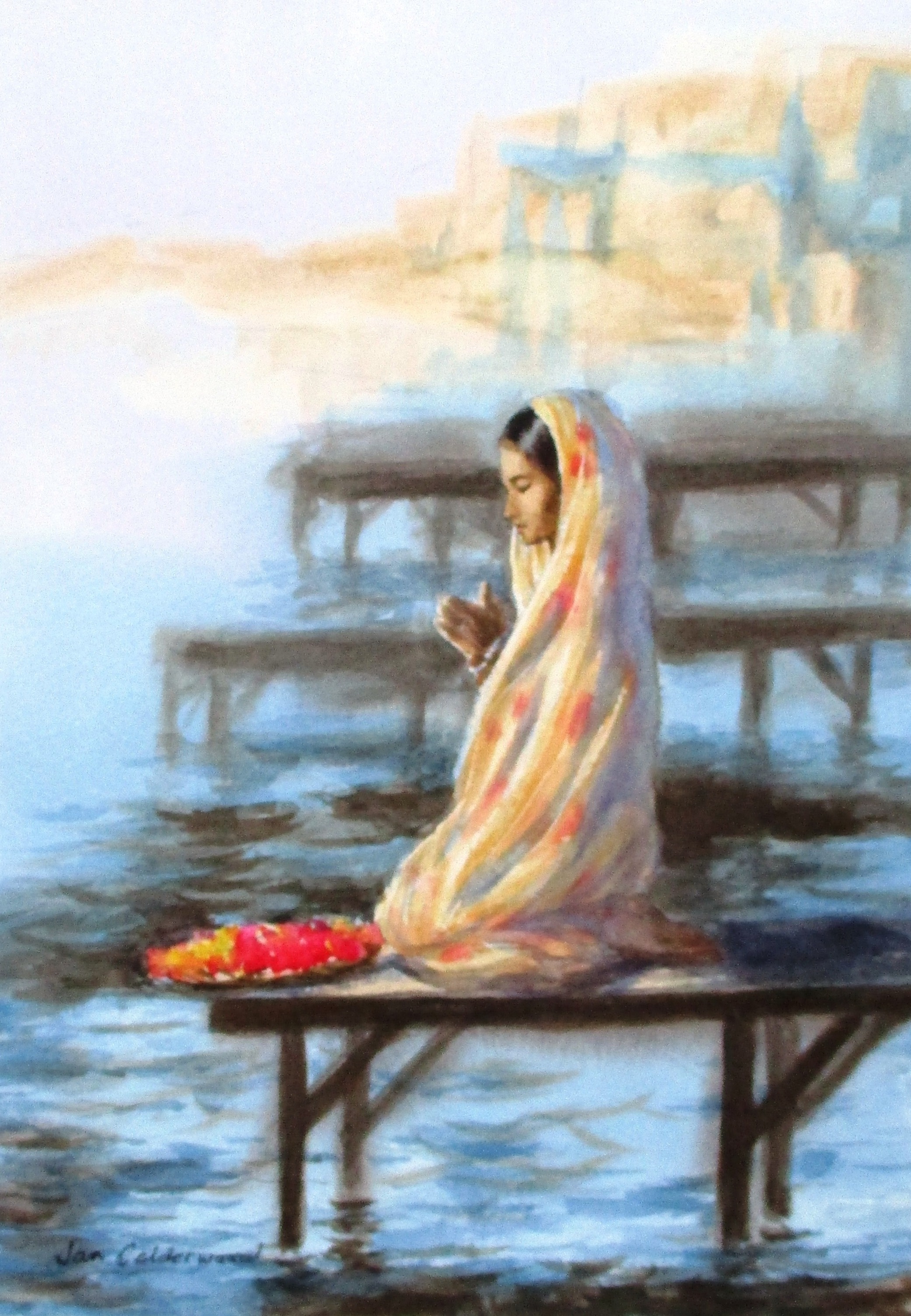 Watercolour of young woman praying beside the Ganges.